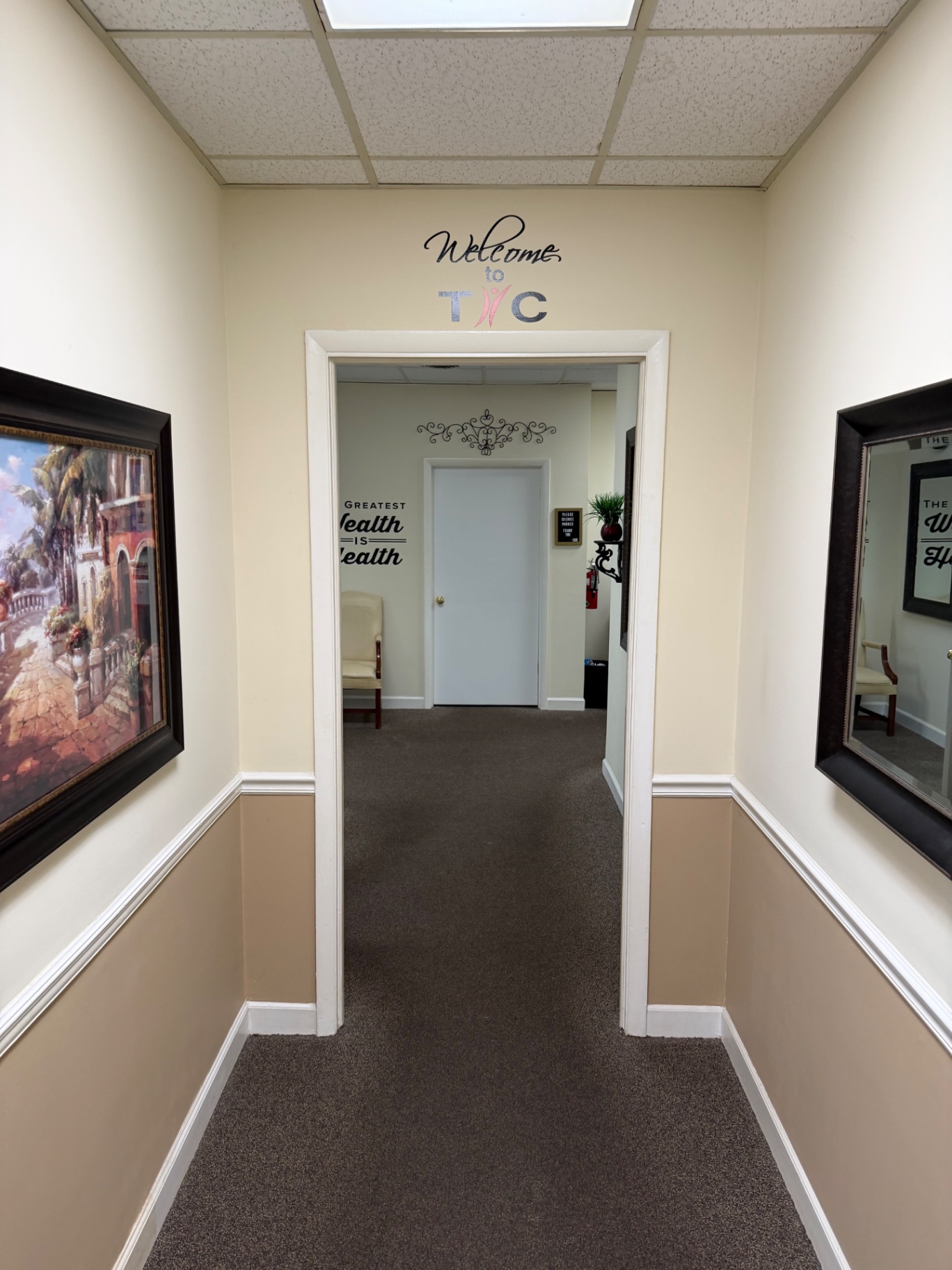 Hallway and welcome sign inside Total Health Chiropractic